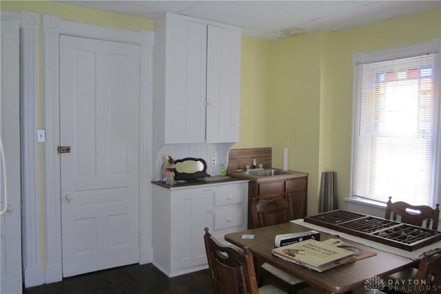1600 Wayne Ave, Dayton, OH 45410 - kitchen with white cabinetry and dark wood-type flooring
