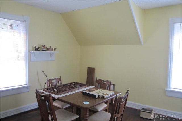 1600 Wayne Ave, Dayton, OH 45410 - dining space with baseboards and vaulted ceiling