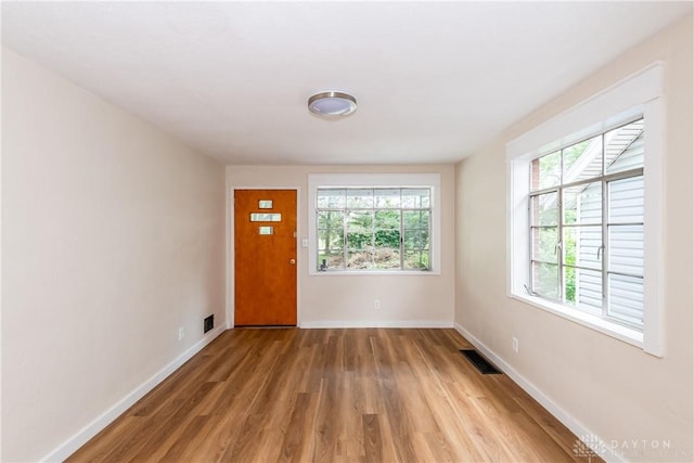 1208 Hale Ave, Dayton, OH 45419 - foyer entrance with wood finished floors and baseboards