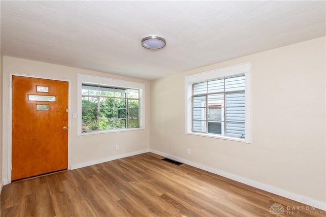 1208 Hale Ave, Dayton, OH 45419 - entryway with baseboards and wood finished floors