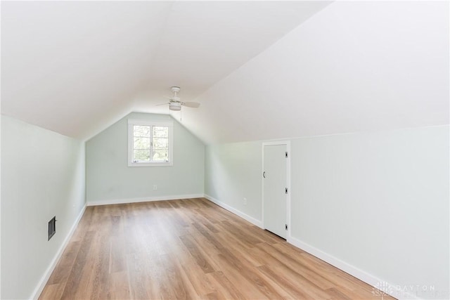 1208 Hale Ave, Dayton, OH 45419 - additional living space with light wood finished floors, ceiling fan, vaulted ceiling, and baseboards