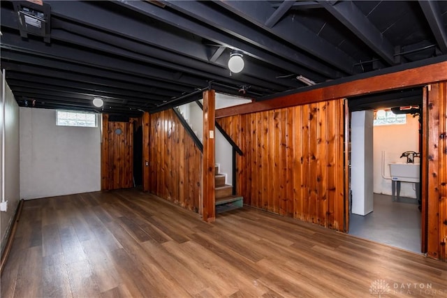 1208 Hale Ave, Dayton, OH 45419 - basement with stairs, healthy amount of natural light, wood finished floors, and a sink