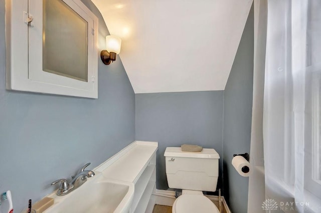 435 Marcia Ave, Hamilton, OH 45013 - bathroom featuring lofted ceiling and toilet
