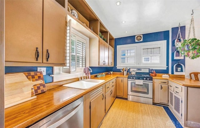435 Marcia Ave, Hamilton, OH 45013 - kitchen with stainless steel appliances, healthy amount of natural light, a sink, recessed lighting, and open shelves