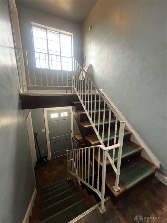 960 Sherwood Dr, Dayton, OH 45406 - stairs with baseboards and wood finished floors