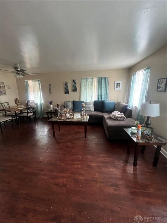 960 Sherwood Dr, Dayton, OH 45406 - living room featuring plenty of natural light, dark wood-type flooring, and a ceiling fan