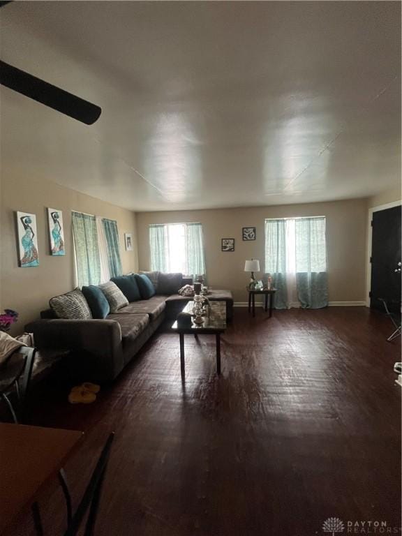 960 Sherwood Dr, Dayton, OH 45406 - living area with plenty of natural light, dark wood finished floors, and baseboards