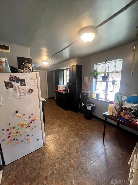 960 Sherwood Dr, Dayton, OH 45406 - kitchen featuring freestanding refrigerator