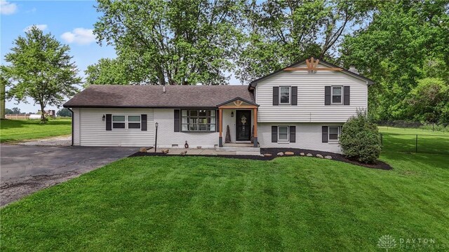 559 Stover Rd, West Alexandria, OH 45381 - split level home featuring driveway and brick siding