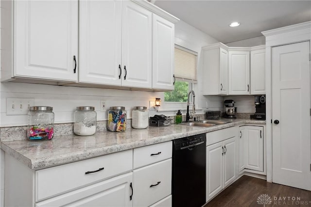 559 Stover Rd, West Alexandria, OH 45381 - kitchen with black dishwasher, a sink, white cabinets, recessed lighting, and dark wood-type flooring