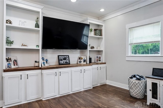 559 Stover Rd, West Alexandria, OH 45381 - living room featuring baseboards, dark wood finished floors, and crown molding