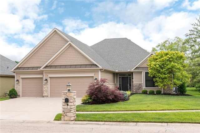 197 Harbour Dr, Springboro, OH 45066 - craftsman-style home featuring an attached garage, a front lawn, driveway, and a standing seam roof