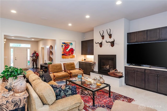 197 Harbour Dr, Springboro, OH 45066 - living area with recessed lighting, a glass covered fireplace, and light carpet