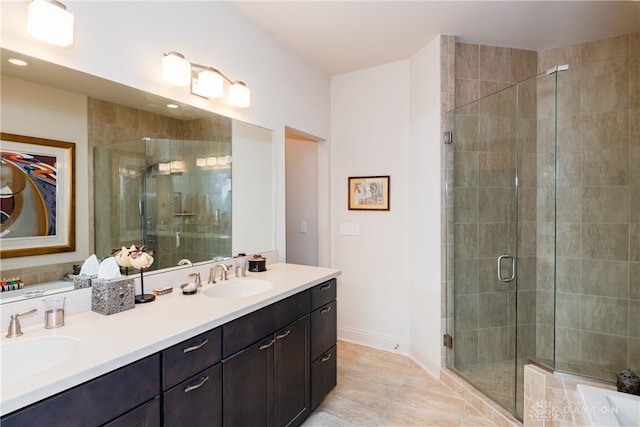 197 Harbour Dr, Springboro, OH 45066 - full bath with double vanity, a shower stall, baseboards, and tile patterned floors