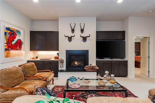 197 Harbour Dr, Springboro, OH 45066 - carpeted living room featuring recessed lighting and a glass covered fireplace