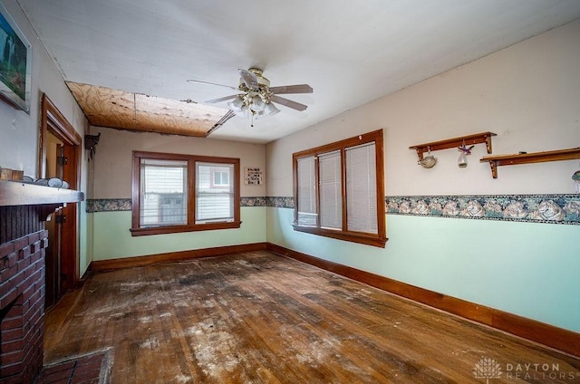 2057 Rugby Rd, Dayton, OH 45406 - unfurnished living room with wood-type flooring and a ceiling fan