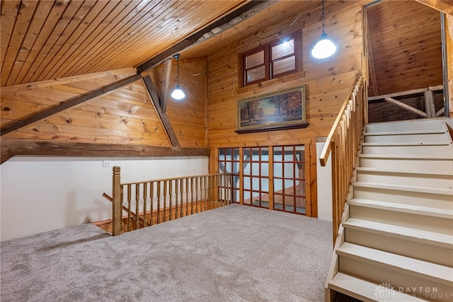 9891 Sugar St, Germantown, OH 45327 - staircase featuring carpet flooring, wood ceiling, and wooden walls
