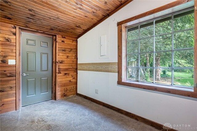 9891 Sugar St, Germantown, OH 45327 - unfurnished room featuring plenty of natural light, concrete floors, and wooden ceiling