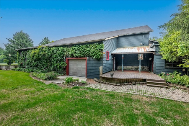 9891 Sugar St, Germantown, OH 45327 - back of property with a deck and an attached garage