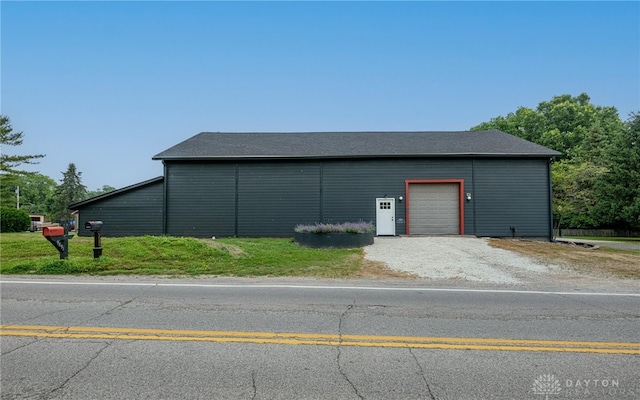 9891 Sugar St, Germantown, OH 45327 - view of outdoor structure with a garage and driveway