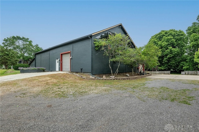 9891 Sugar St, Germantown, OH 45327 - view of home's exterior with a garage and driveway