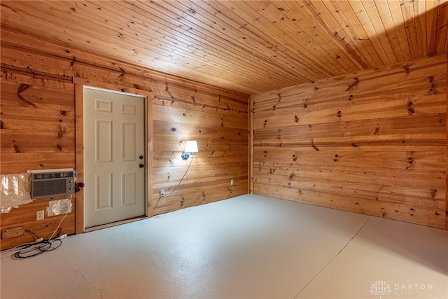9891 Sugar St, Germantown, OH 45327 - unfurnished room with wooden walls, concrete flooring, a wall mounted air conditioner, and wooden ceiling
