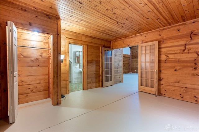 9891 Sugar St, Germantown, OH 45327 - unfurnished room featuring wooden walls, wood ceiling, and finished concrete floors