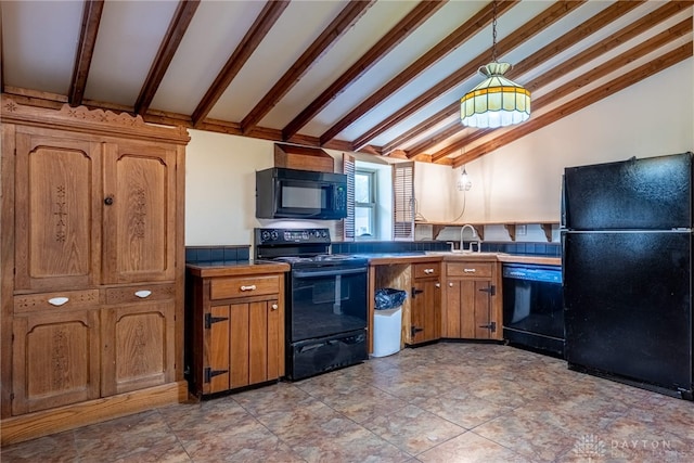 9891 Sugar St, Germantown, OH 45327 - kitchen featuring black appliances, brown cabinetry, and hanging light fixtures