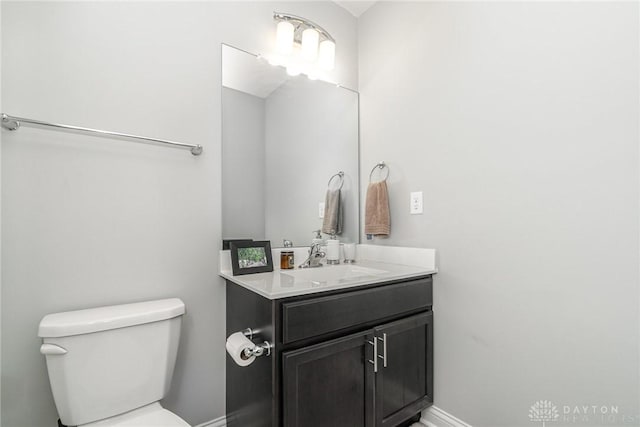 902 Brownstone Row, Springboro, OH 45066 - bathroom featuring vanity, toilet, and baseboards