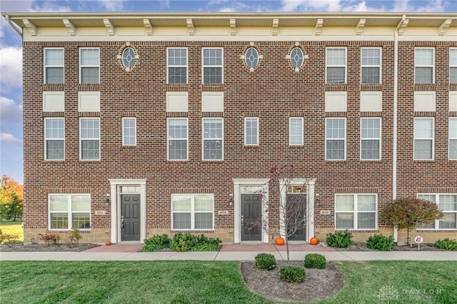 902 Brownstone Row, Springboro, OH 45066 - view of front of house with brick siding and a front yard