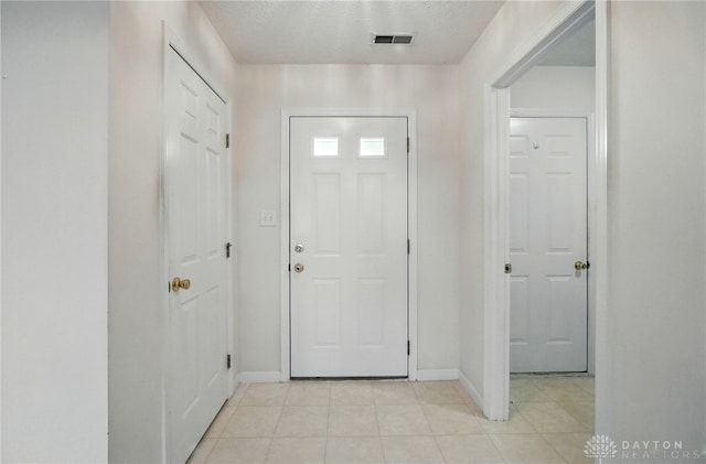 5555 Stone Path Dr, Middletown, OH 45042 - entryway featuring baseboards and light tile patterned floors