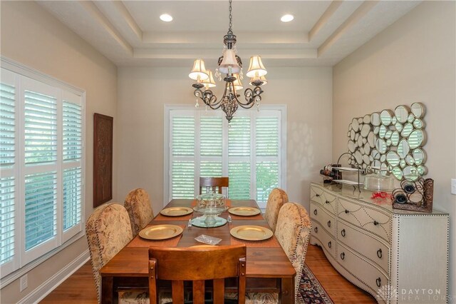 2082 Tamarack Ridge Ct, Beavercreek, OH 45431 - dining area with a chandelier, a tray ceiling, and plenty of natural light