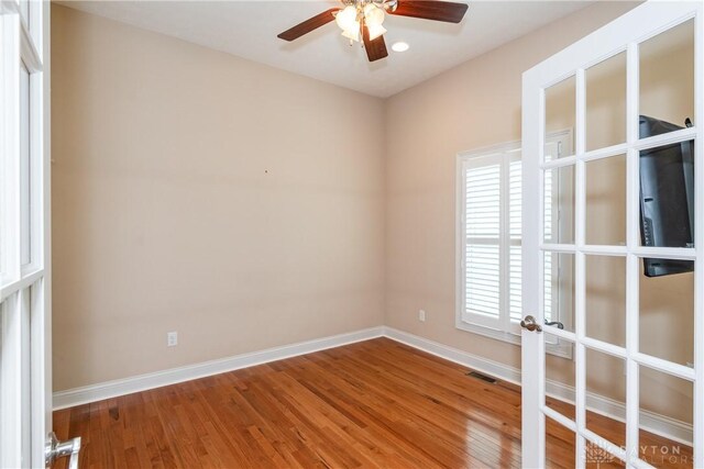 2082 Tamarack Ridge Ct, Beavercreek, OH 45431 - spare room with ceiling fan and wood finished floors