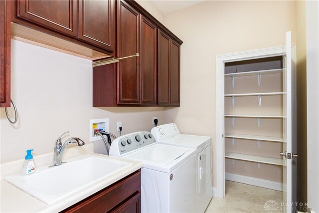 2082 Tamarack Ridge Ct, Beavercreek, OH 45431 - laundry area with cabinet space, independent washer and dryer, and light tile patterned floors