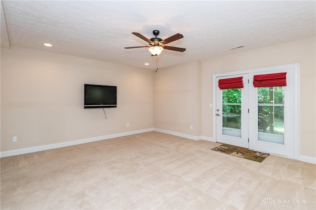 2082 Tamarack Ridge Ct, Beavercreek, OH 45431 - unfurnished living room featuring light colored carpet, ceiling fan, and recessed lighting