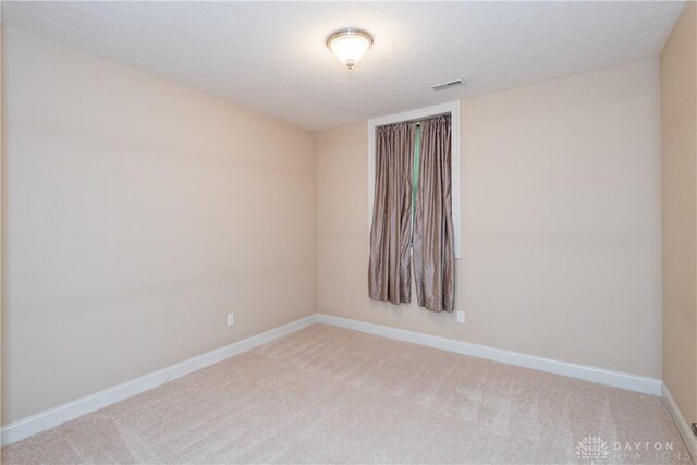 2082 Tamarack Ridge Ct, Beavercreek, OH 45431 - unfurnished room with light colored carpet