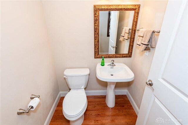 2082 Tamarack Ridge Ct, Beavercreek, OH 45431 - half bath featuring toilet and wood finished floors