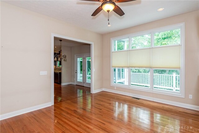2082 Tamarack Ridge Ct, Beavercreek, OH 45431 - empty room with wood finished floors and a ceiling fan
