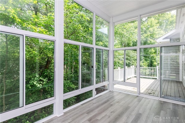 2082 Tamarack Ridge Ct, Beavercreek, OH 45431 - unfurnished sunroom with wood finished floors and a wooden deck