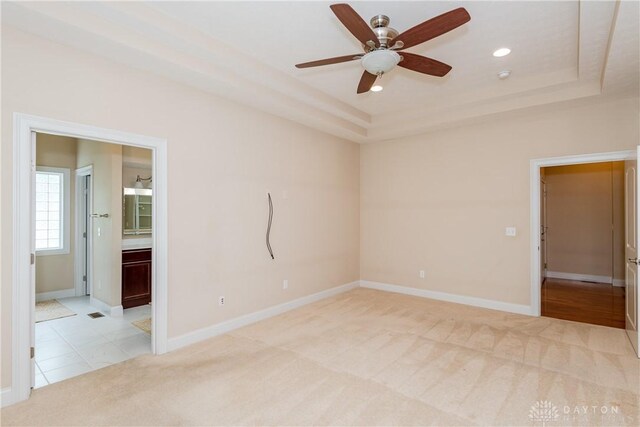 2082 Tamarack Ridge Ct, Beavercreek, OH 45431 - unfurnished room with a tray ceiling, ceiling fan, light carpet, and recessed lighting