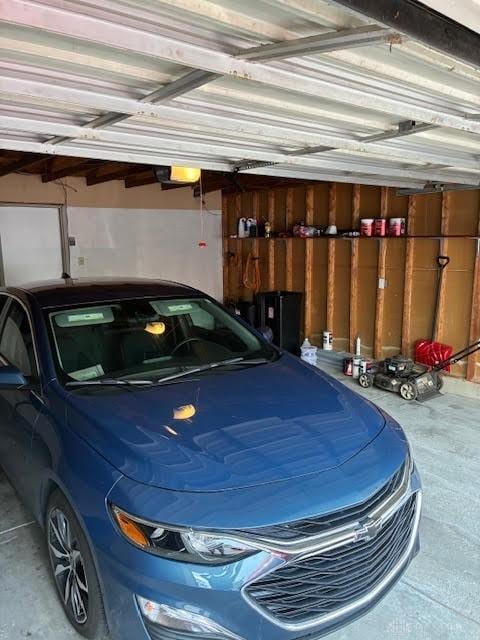 8722 Washington Colony Dr, Dayton, OH 45458 - garage featuring a garage door opener