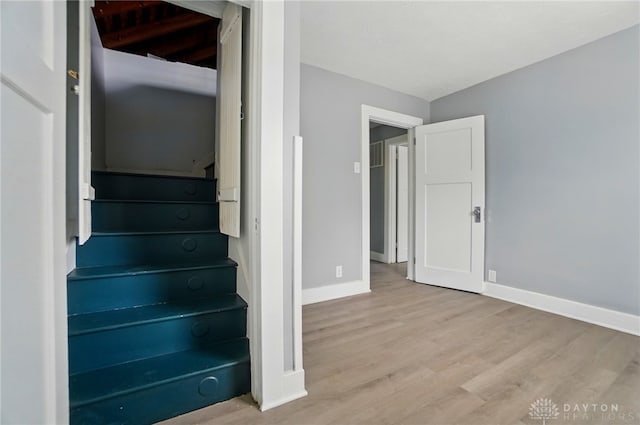 123 Delaware Ave, Dayton, OH 45405 - stairway featuring baseboards and wood finished floors