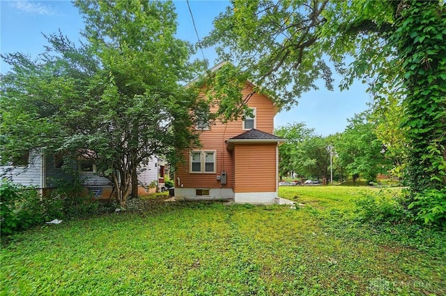 123 Delaware Ave, Dayton, OH 45405 - rear view of property featuring a yard