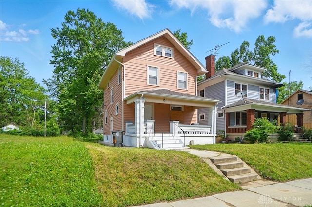 123 Delaware Ave, Dayton, OH 45405 - traditional style home with covered porch and a front lawn