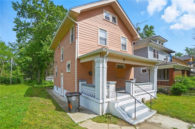 123 Delaware Ave, Dayton, OH 45405 - traditional style home featuring covered porch and a front lawn