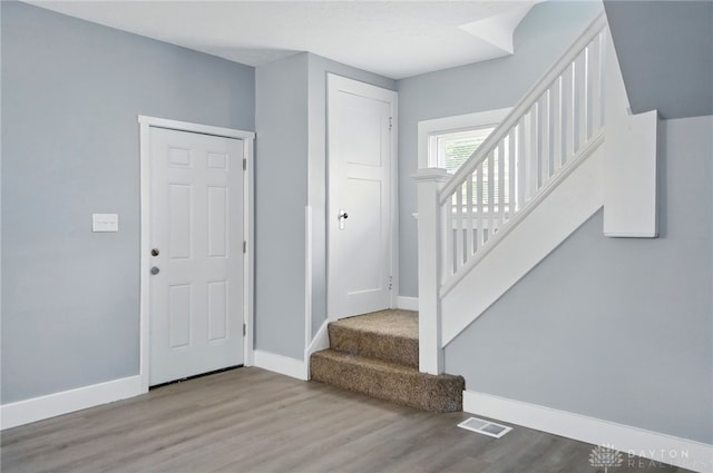 123 Delaware Ave, Dayton, OH 45405 - entryway with wood finished floors and stairs