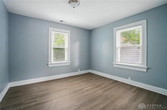 123 Delaware Ave, Dayton, OH 45405 - spare room featuring dark wood finished floors and baseboards