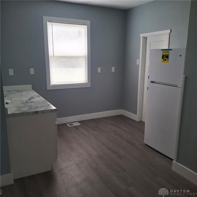123 Delaware Ave, Dayton, OH 45405 - unfurnished dining area featuring wood finished floors