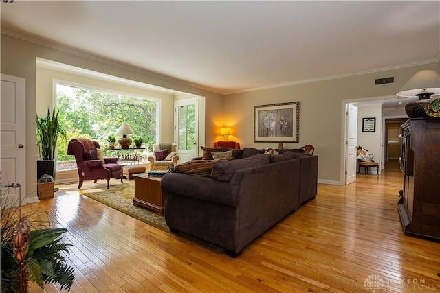 446 Lookout Rdg, Oakwood, OH 45419 - living room featuring light wood-type flooring, crown molding, and baseboards