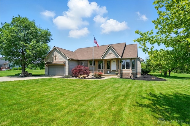 5193 Horseshoe Dr, Lewisburg, OH 45338 - view of front of property featuring a garage, a front yard, driveway, and a porch